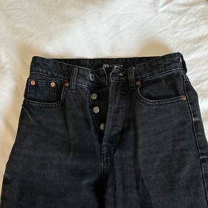 SOLD ankle cropped raw hem black jeans